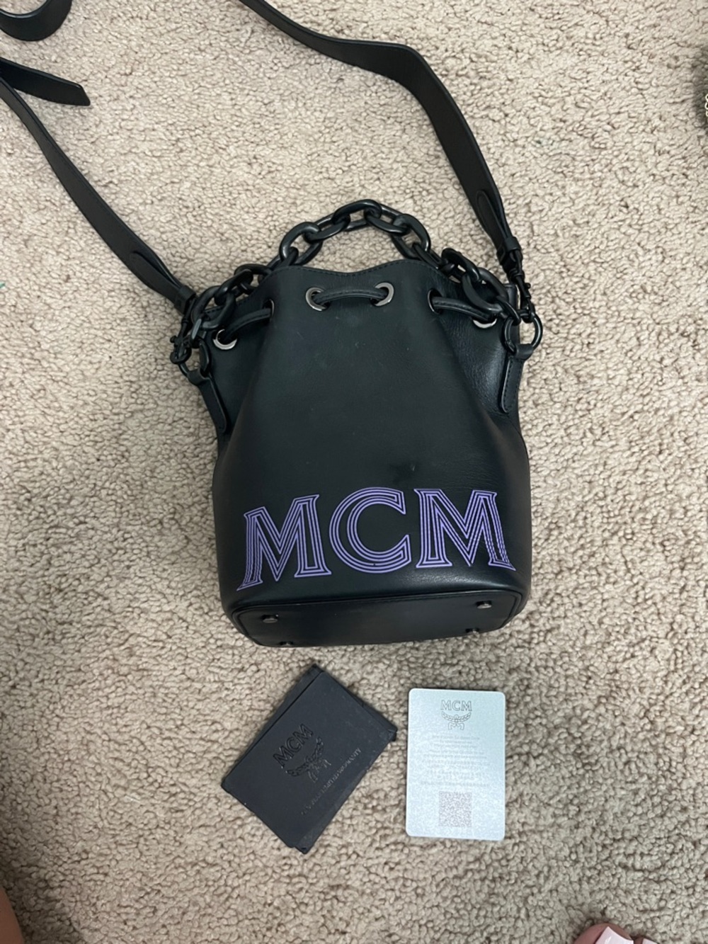MCM Black Leather Bucket Crossbody with Purple Logo